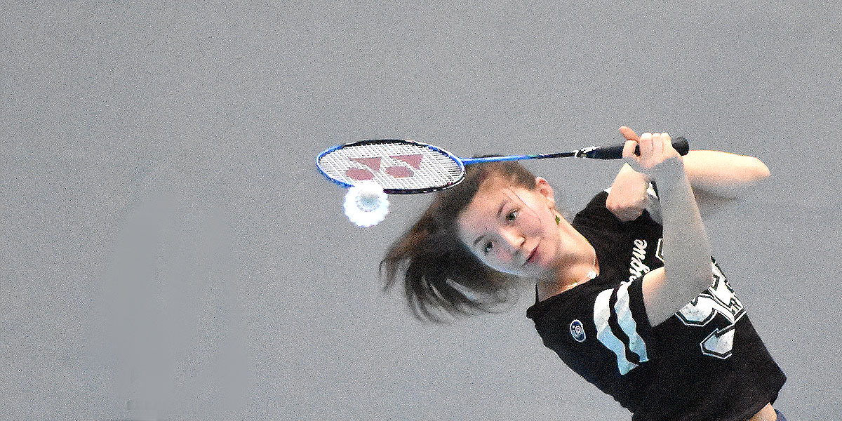 A Girl Playing Badminton